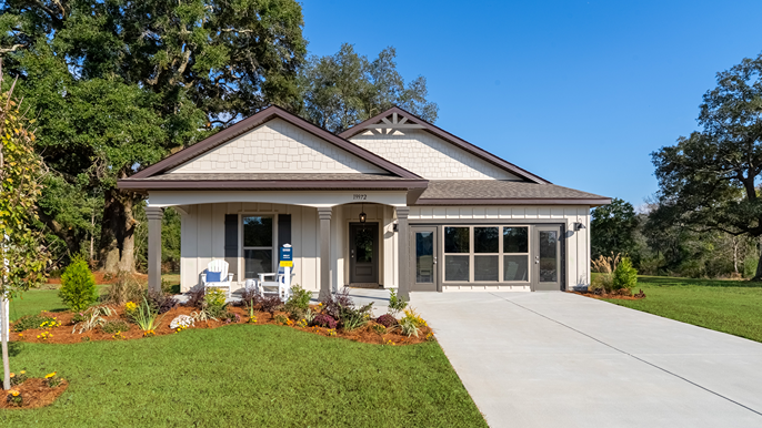 Single-story home with a covered front porch and two-car garage.