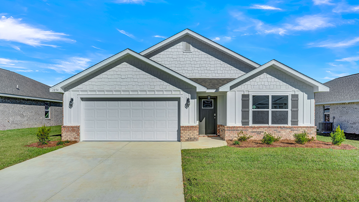 One-story home with board and batten exterior, a brick water table, and two-car garage.