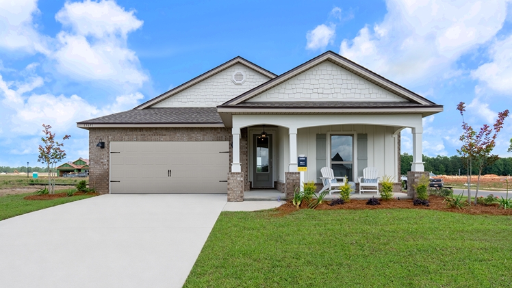 One-story home with a covered front porch and two-car garage.