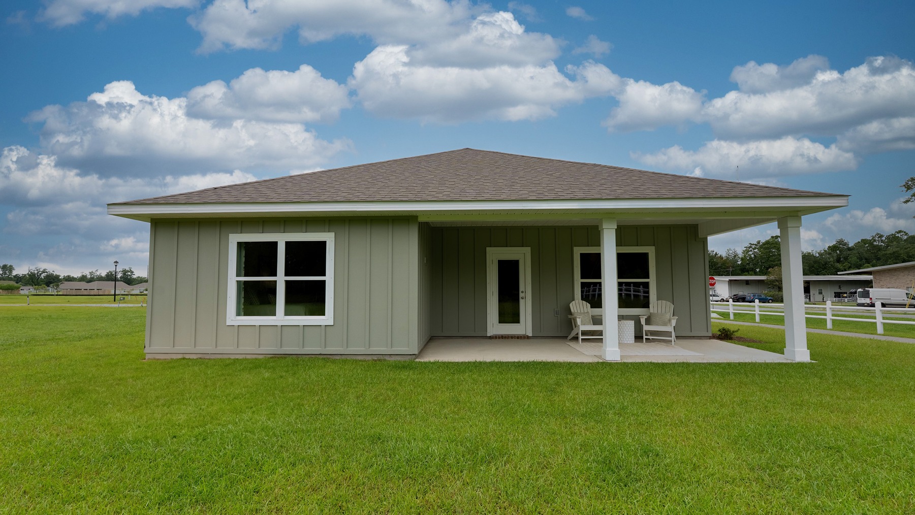 The Ryder's large, covered back porch & exterior/