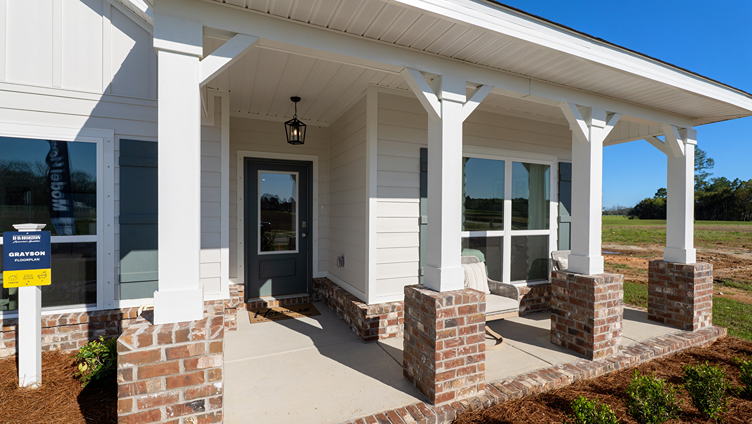 Covered front porch and outdoor furniture.