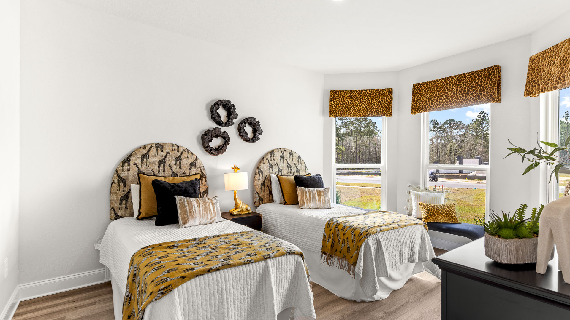 Open concept Isabella interior with bay window in front bedroom.