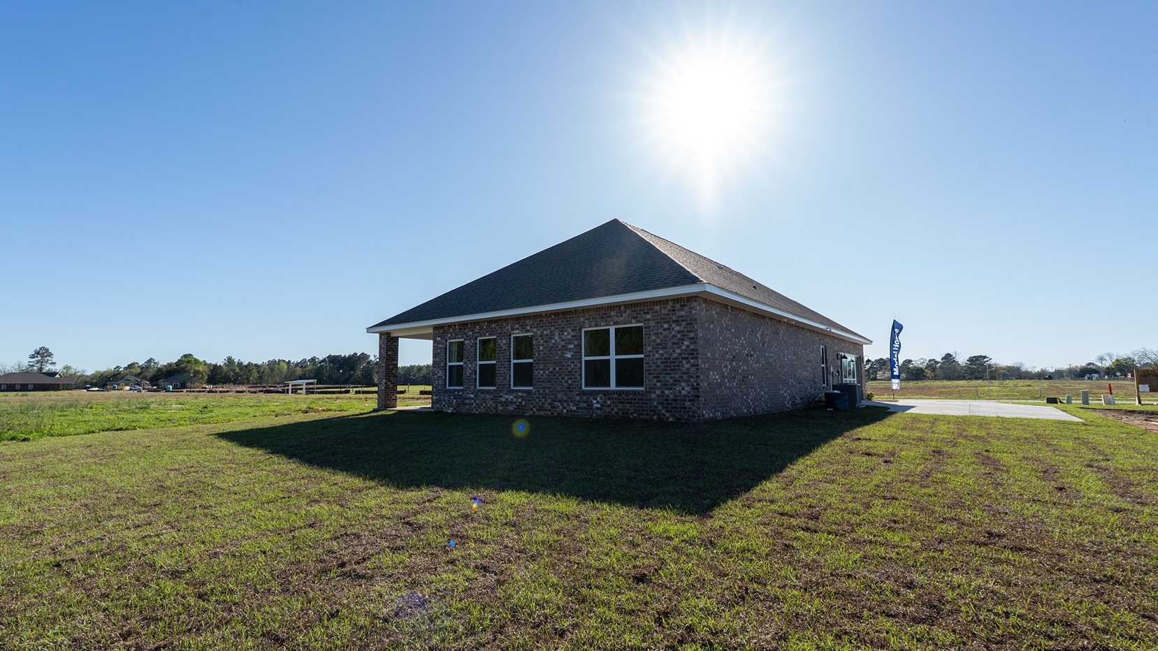 Covered back porch & back exterior on large lot
