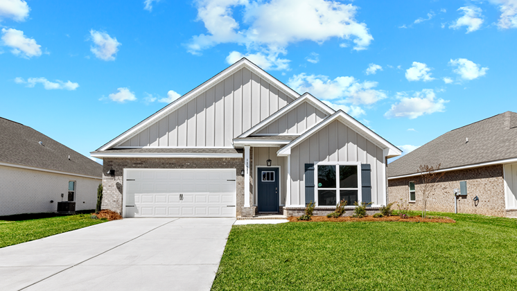 Single-story home with a covered front porch and two-car garage.