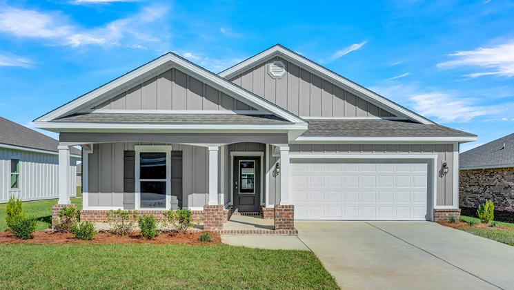 One-story home with a covered front porch and two-car garage.