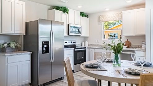 Interior picture of open-concept great room and kitchen.