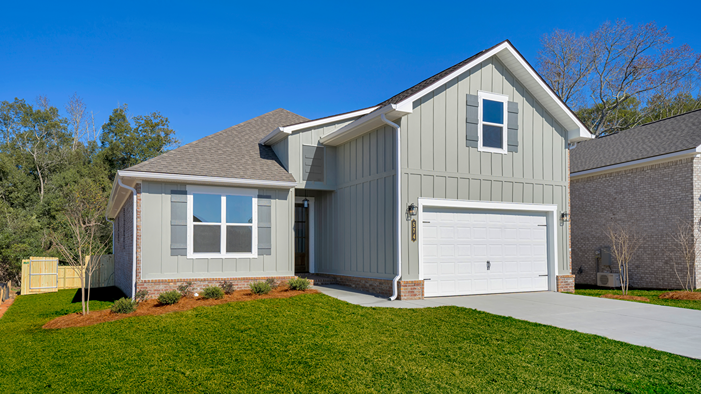Two=story home with a two-car garage.