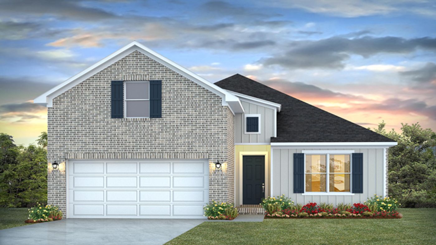 New home exterior with brick and Hardie board with garage.