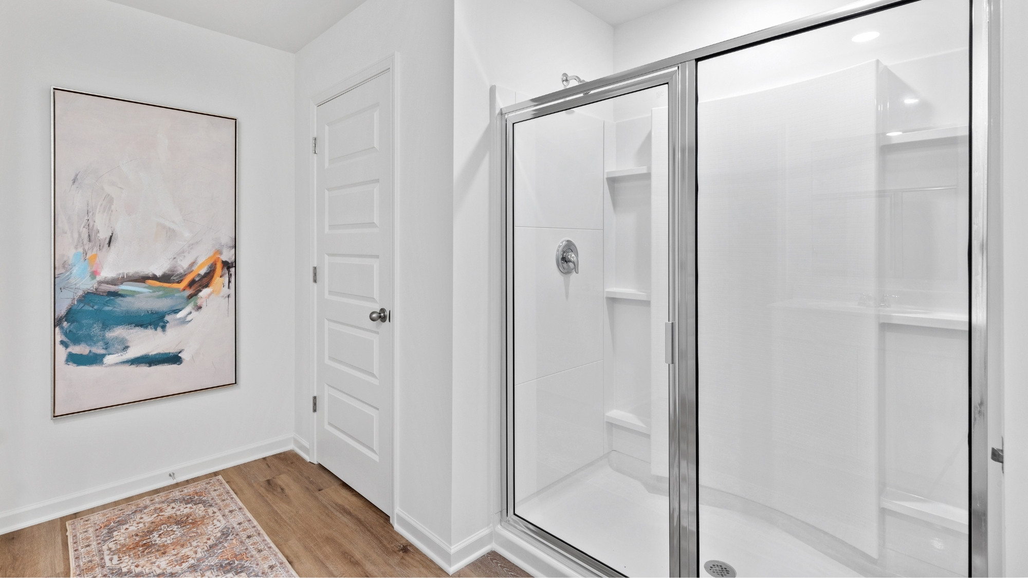 Primary bathroom with a garden soaking tub and separate shower.