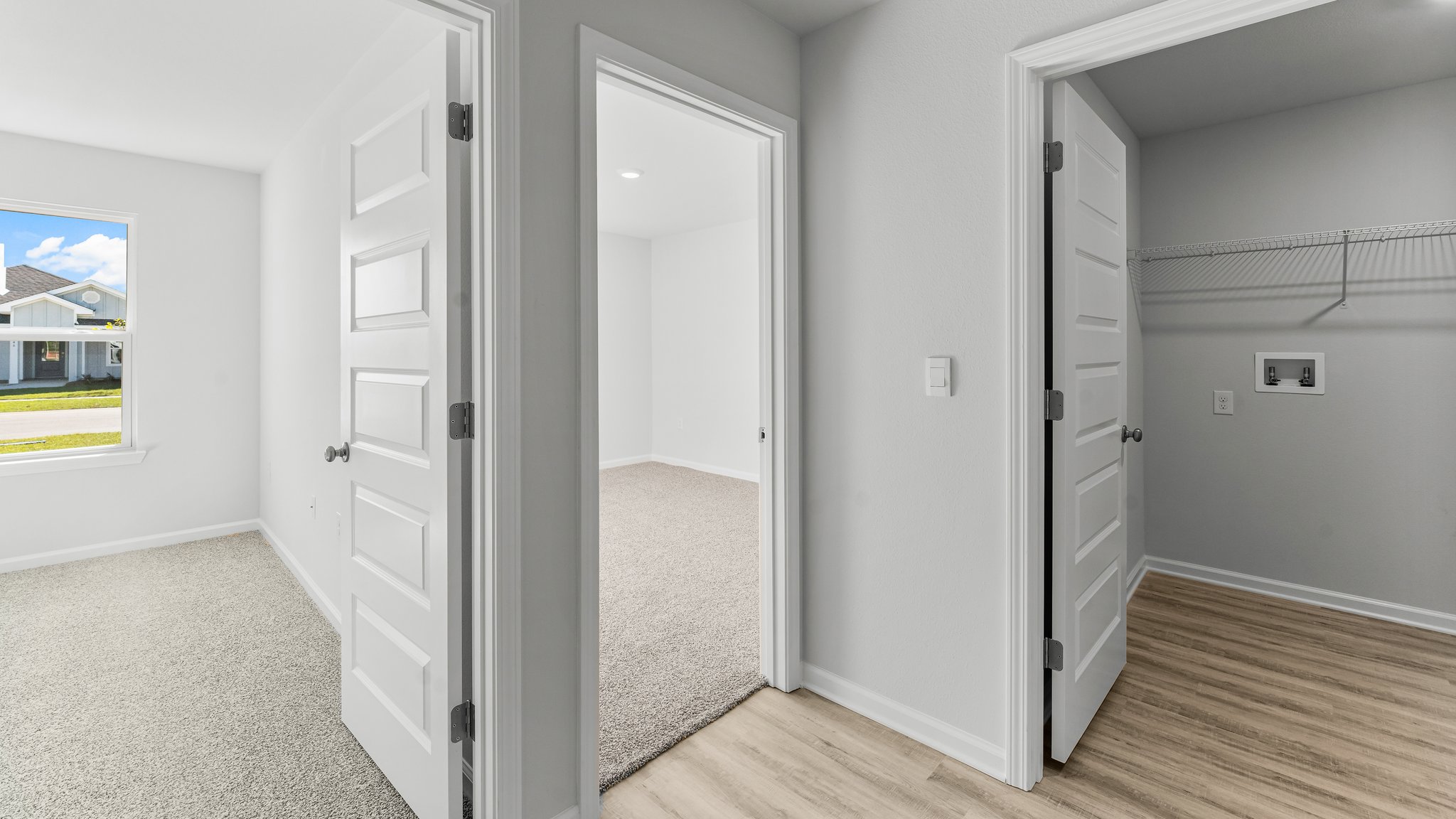 Front hallway with light-toned vinyl flooring.