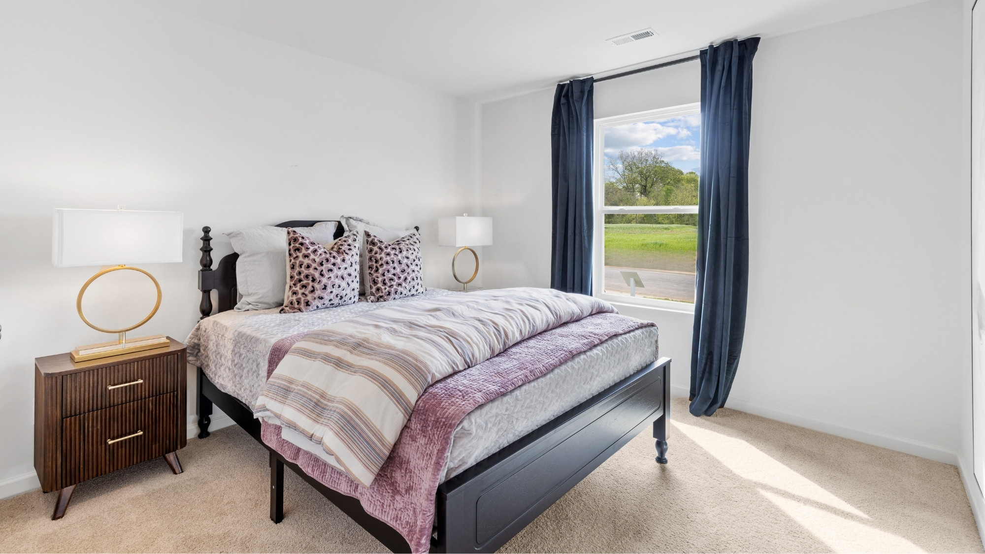 Additional bedroom located at the opposite end of the home.