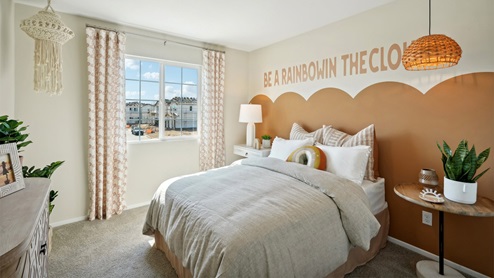 Fully furnished bedroom with full bed