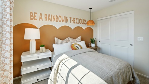 Fully furnished bedroom with full bed