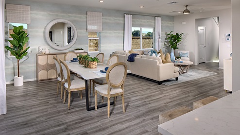 Open-concept dining with table and great room area