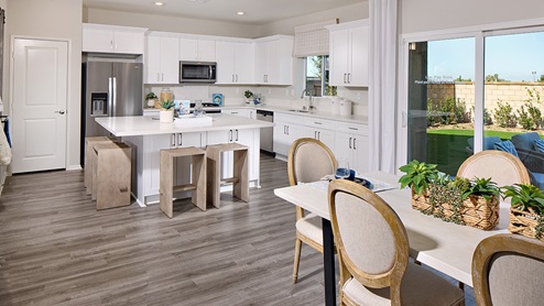 Kitchen with white cabinets and stainless steel appliances