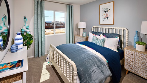 Fully furnished bedroom with full bed