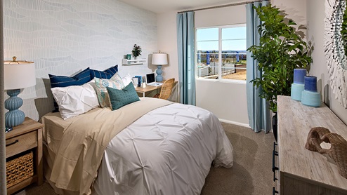 Fully furnished bedroom with full bed