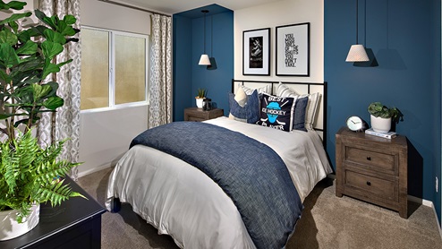 Fully furnished bedroom with full bed