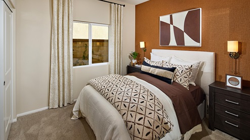 Fully furnished bedroom with full bed