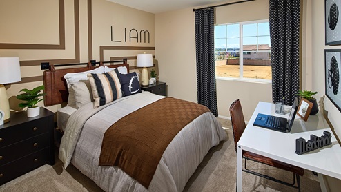 Fully furnished bedroom with full bed