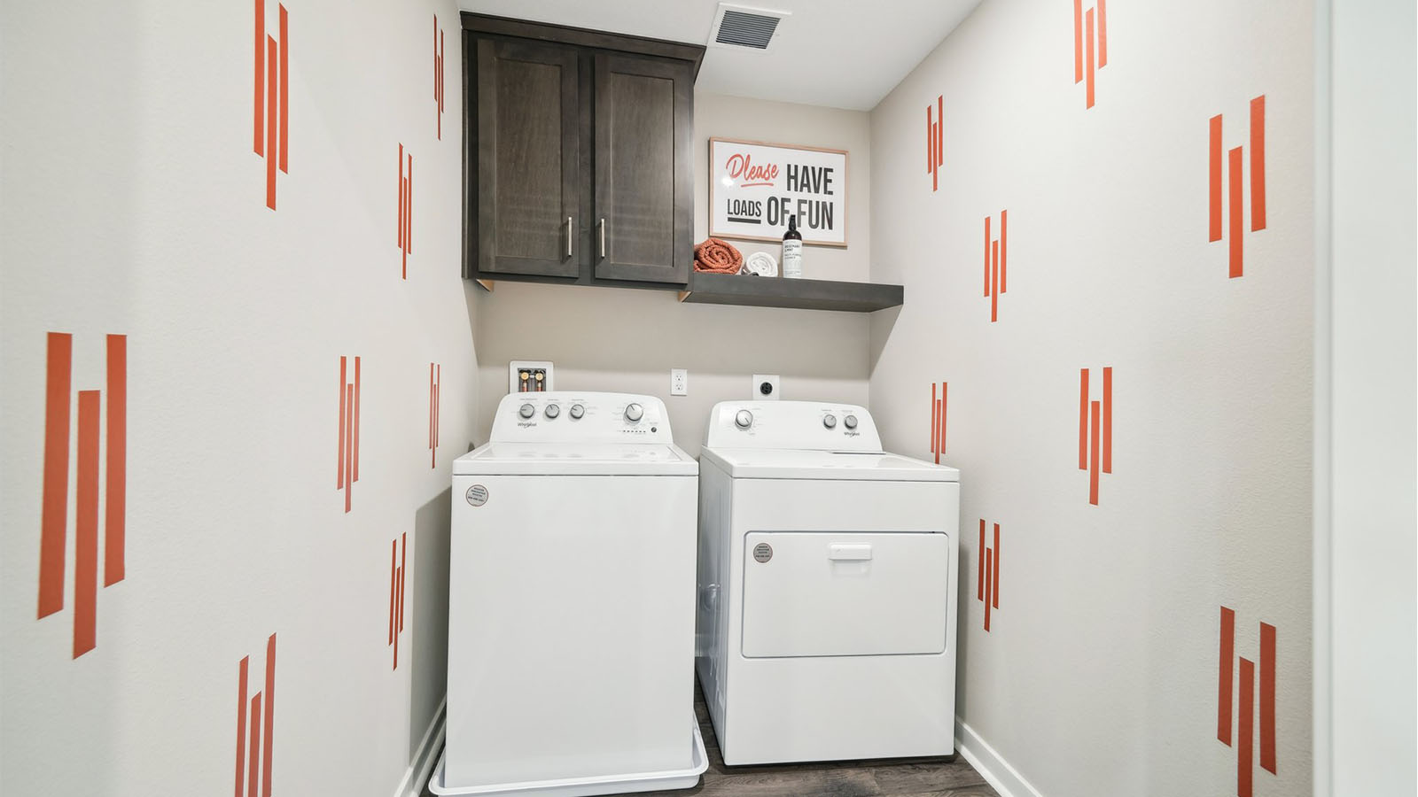 Laundry room with upper shelf, and cabinet