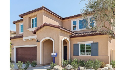 Two-story Italianate home with shutters and two-car garage