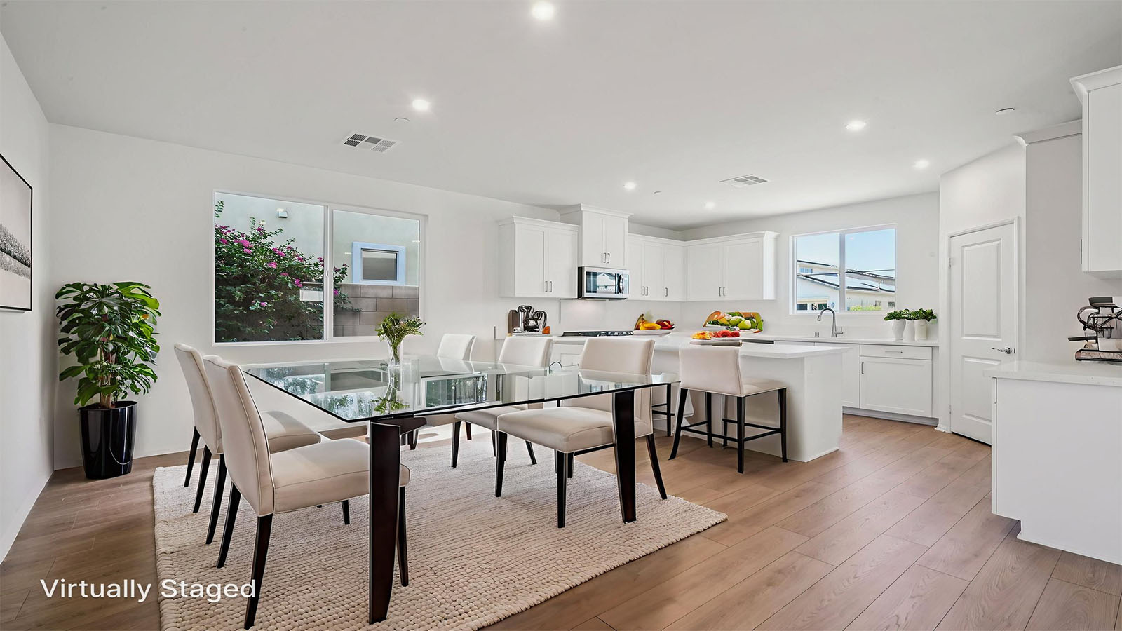 Spacious open-concept great room, dining room and kitchen