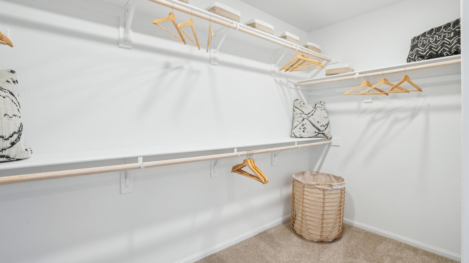 Primary bedroom walk-in closet