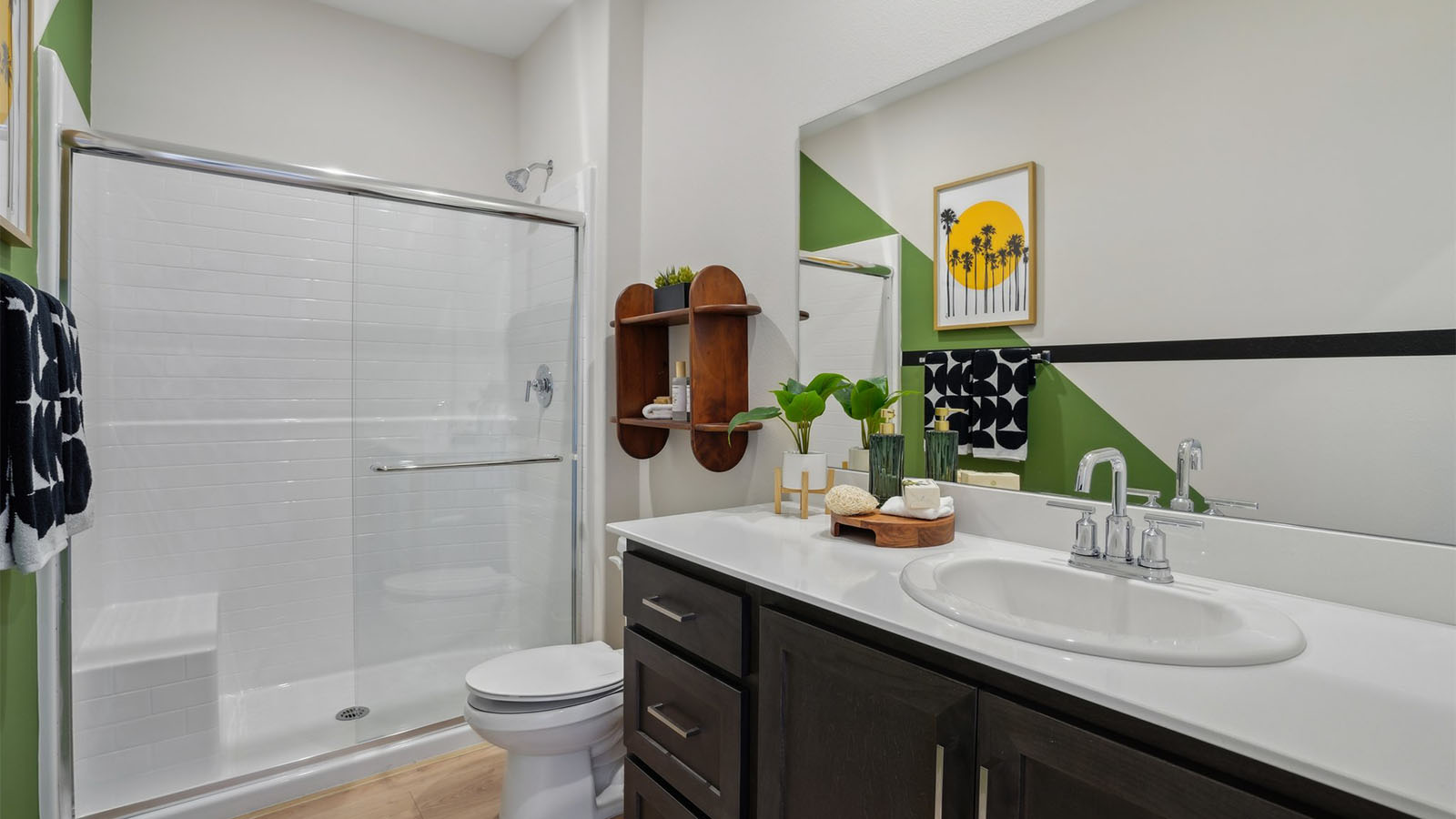 Secondary bathroom with vanity and shower