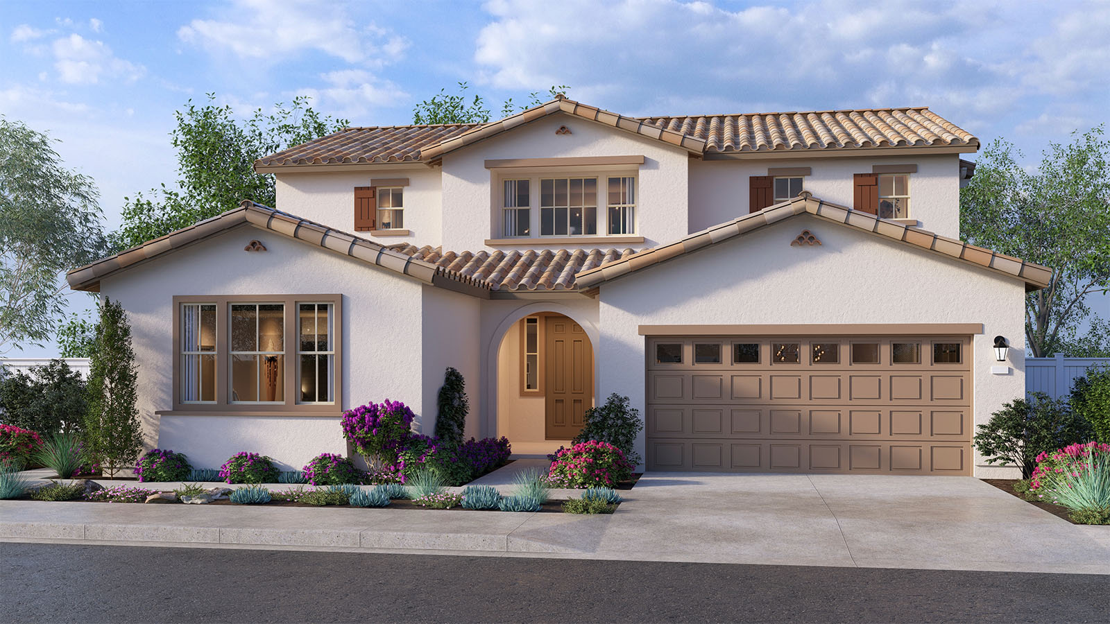 Two-story Spanish home with two-car garage and shutters