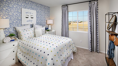 Fully furnished bedroom with plush carpet