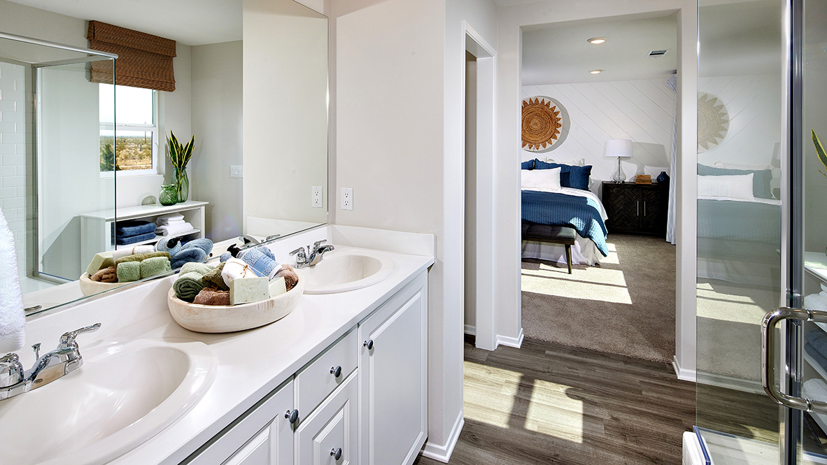 Primary bathroom with walk in shower and double sinks