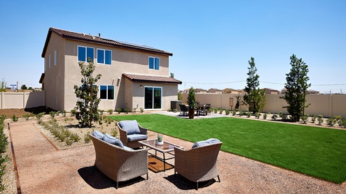 Spacious backyard with patio area