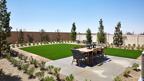 Spacious backyard with patio area