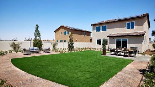 Spacious backyard with patio area