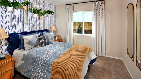 Fully furnished bedroom with full size bed