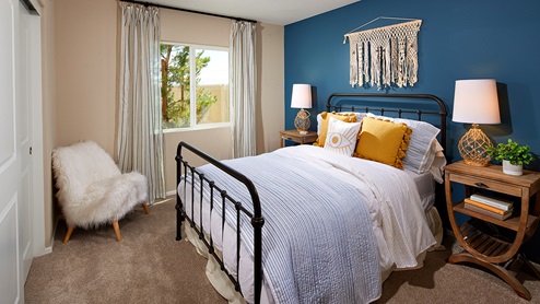 Fully furnished bedroom with full bed