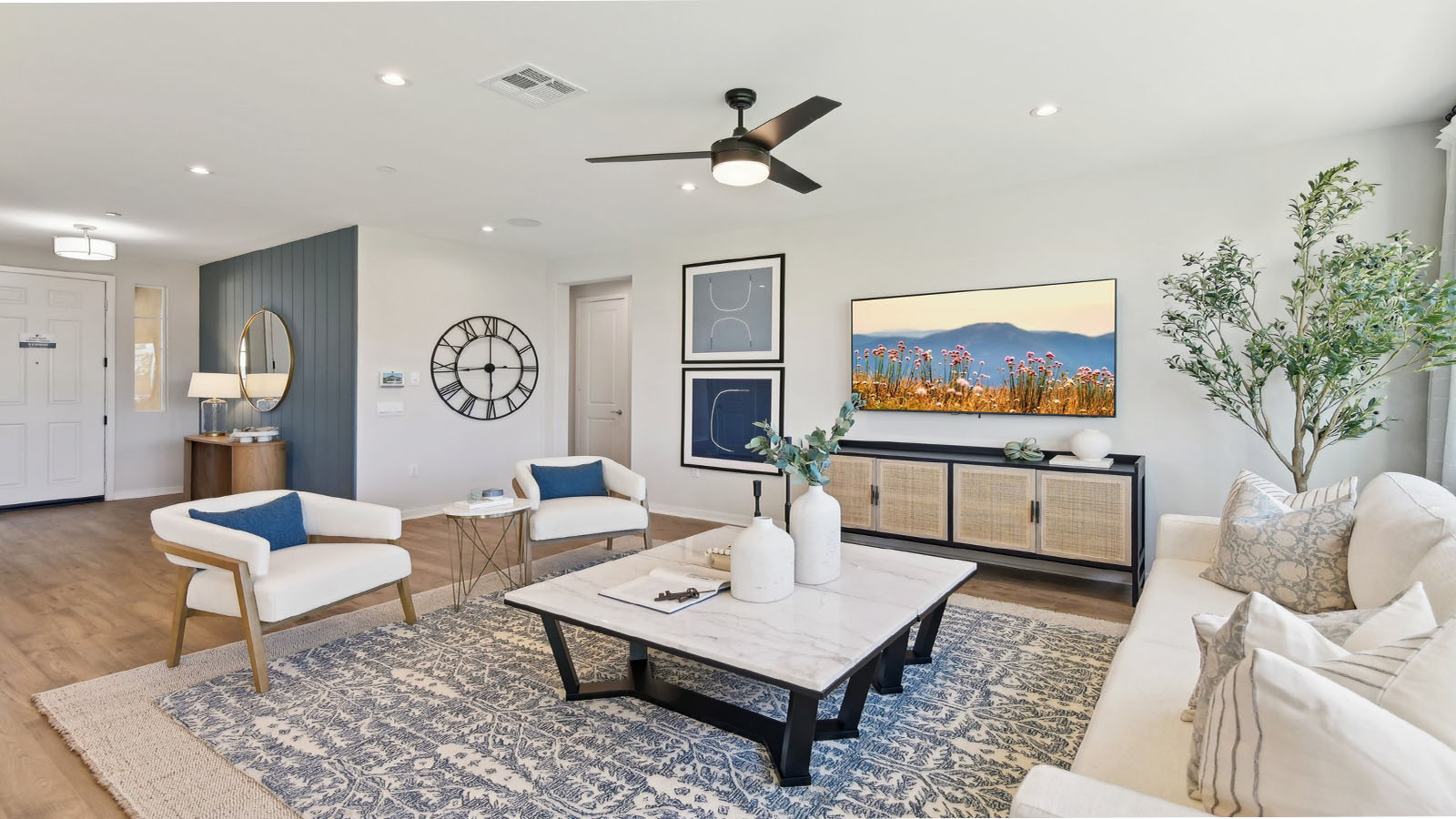 Spacious open-concept great room with laminate flooring