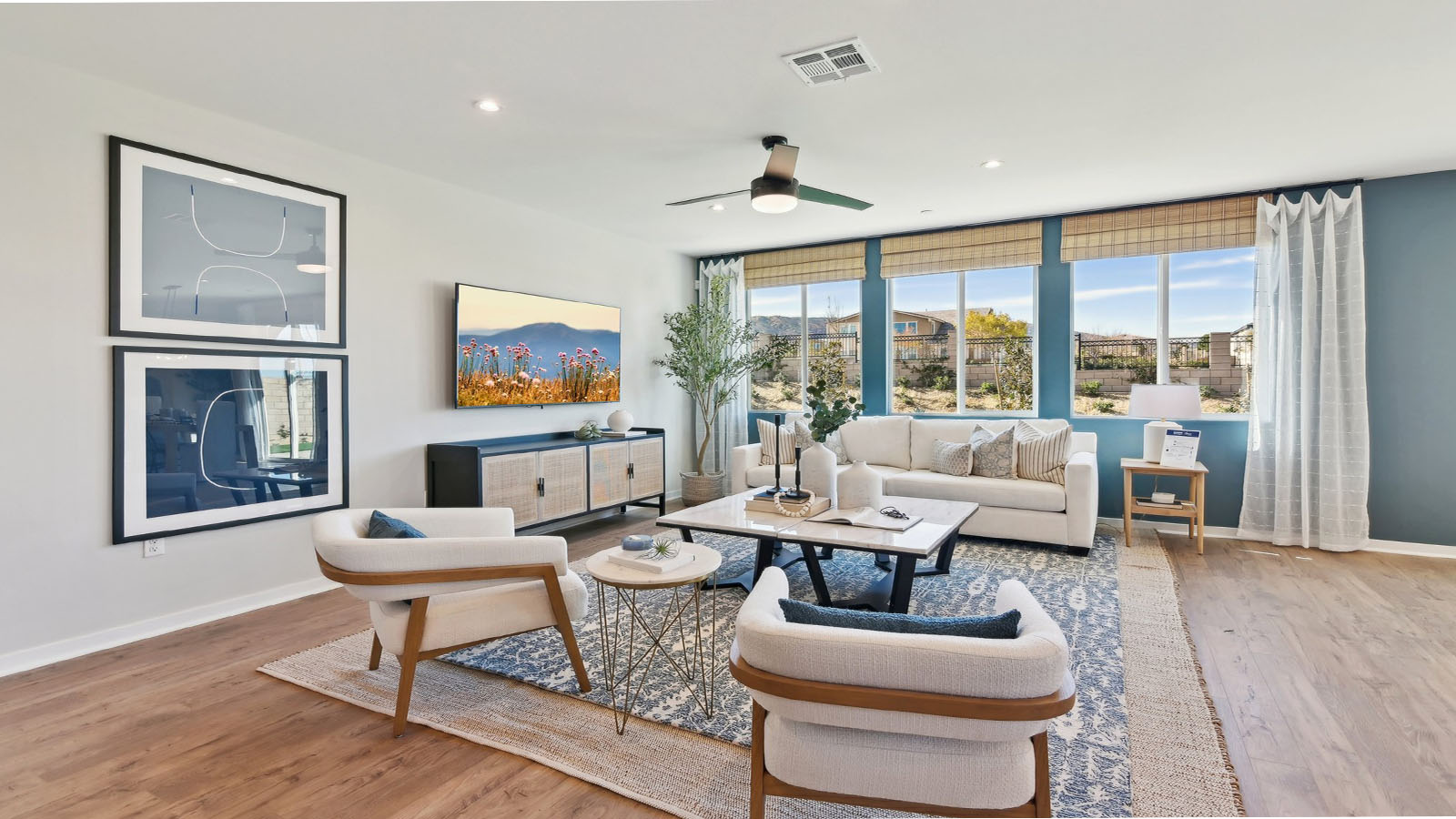 Spacious open-concept great room with laminate flooring