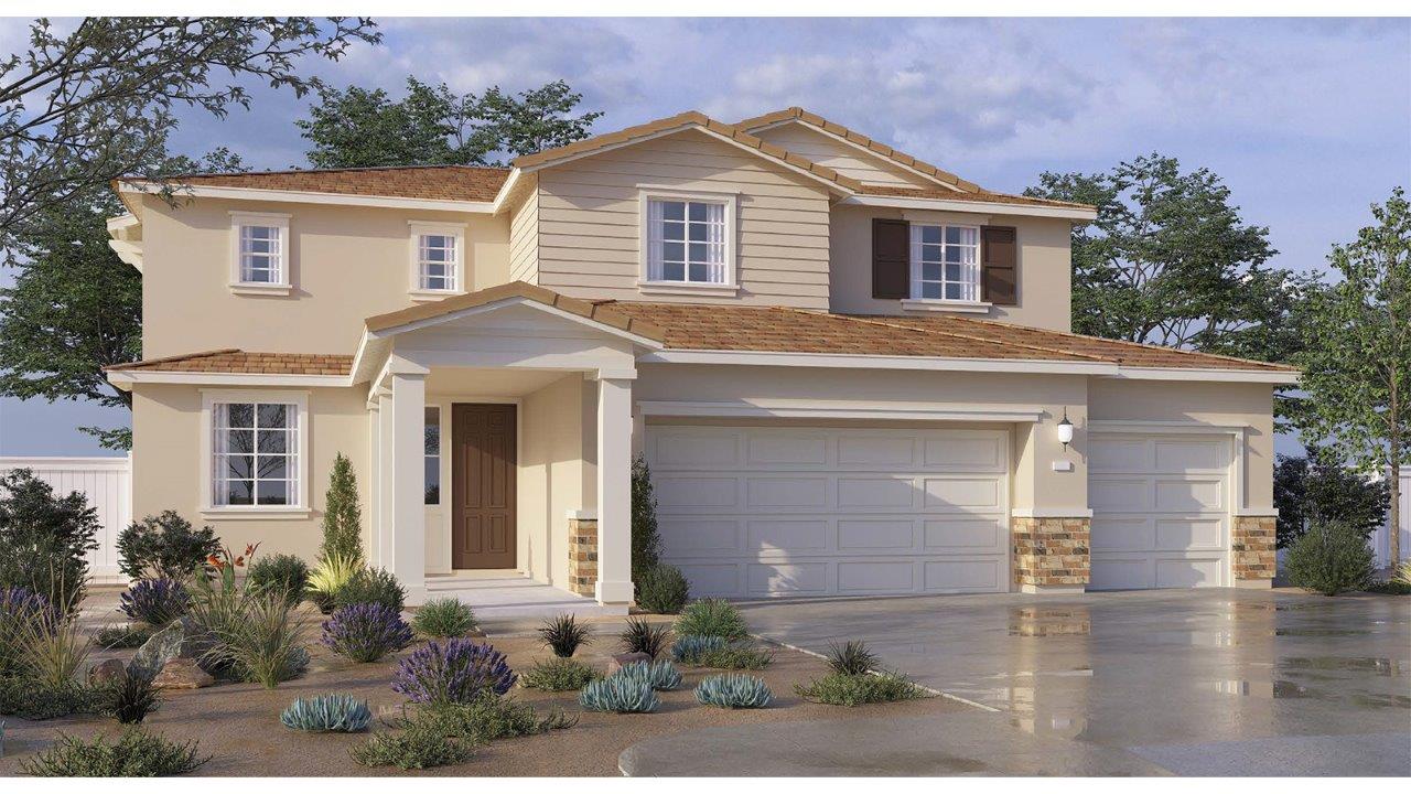 Two-story Traditional home with siding and brick veneer and three-car garage