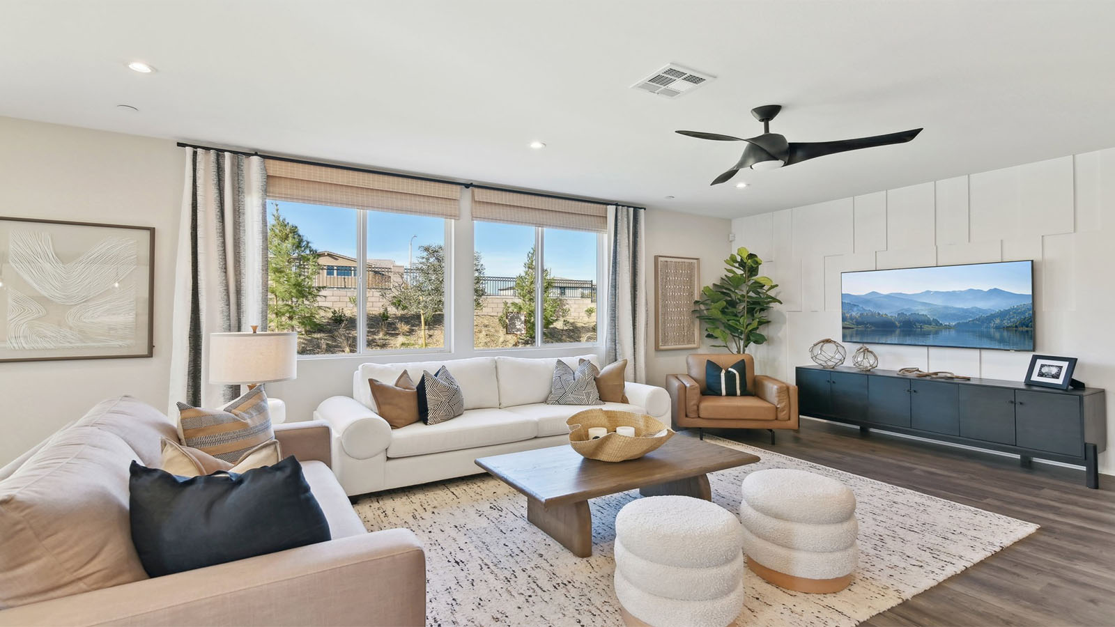 Spacious open-concept great room with laminate flooring