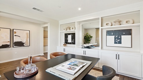 Home office with built-in cabinets