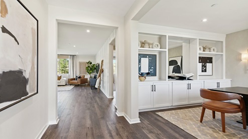 Home office with built-in cabinets