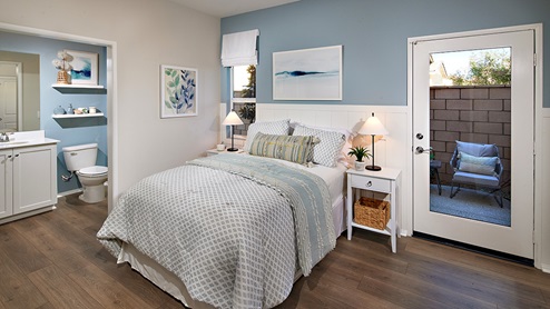 Multi-gen bedroom with door for yard access