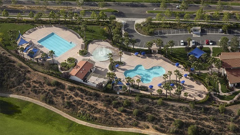 Community pool featuring amenities