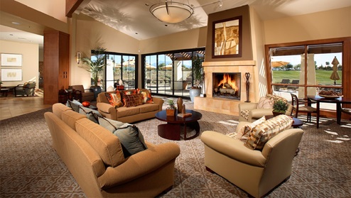 Clubhouse interior with sitting area and fireplace