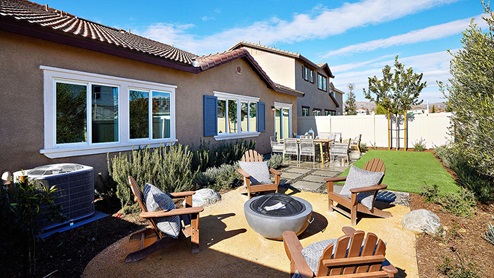 Spacious backyard with patio area