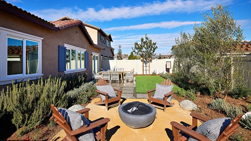 Spacious backyard with patio area