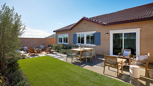 Spacious backyard with patio area