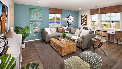 Open-concept loft area with plush carpet